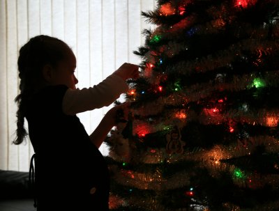 Jazzy decorating the Christmas Tree