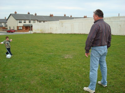 Grandad plays soccer with Sean