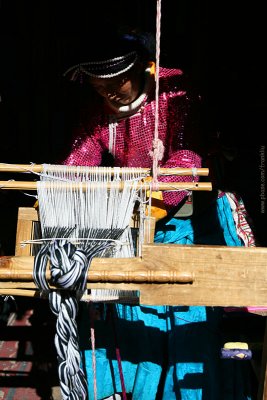 Weaving Mosuo woman