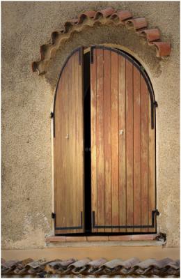 Brown Arched Shutters