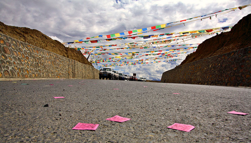 Prayers are commonly tossed from the vehicles when going over a pass.