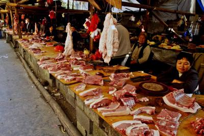 Outdoor meat market. Jishou City, Hunan Province, China
