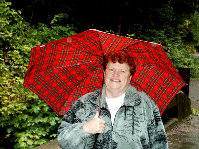 Redhead with Red Umbrella