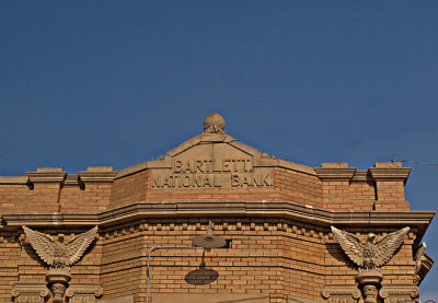 Detail of the Bank Bldg showing brickwork and eagles.