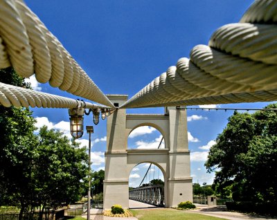 This bridge built in 1870 was the first bridge to span the Brazos River in Waco