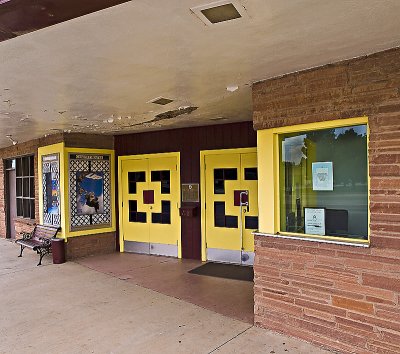 The box  office, theater entrance and bill of fare