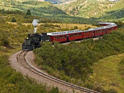 The scenic railroad train headed around a curve enroute to Chama, NM