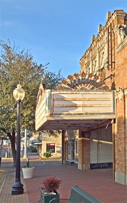 A side view of the theater marquee and sign