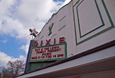 A side view of the theater marquee and star above.