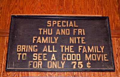 This sign is an original which hung inside the  Uptown Theater when it was still operating. 