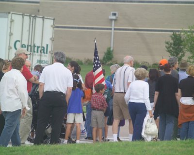 Families entering the rally