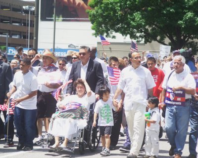 Matriarch of Dallas Hispanic Community leads the March in her Wheelchair