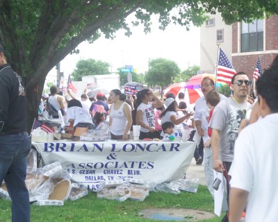 Brian Loncar Insurance Company hading out free water to the marchers