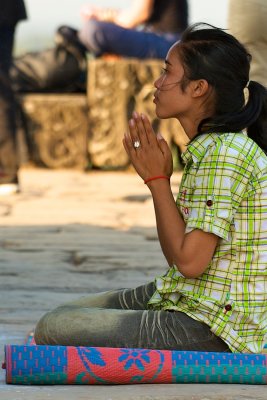 Praying in Angkor