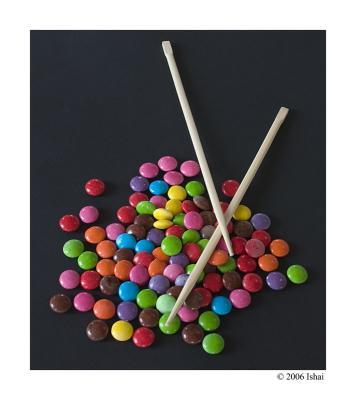 Chopsticks with M&Ms (abstract)