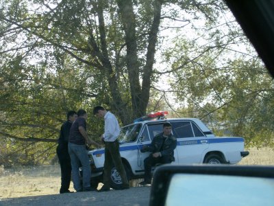 A little trouble with the police near Taraz.  Karat and Mirambek in negotiation.
