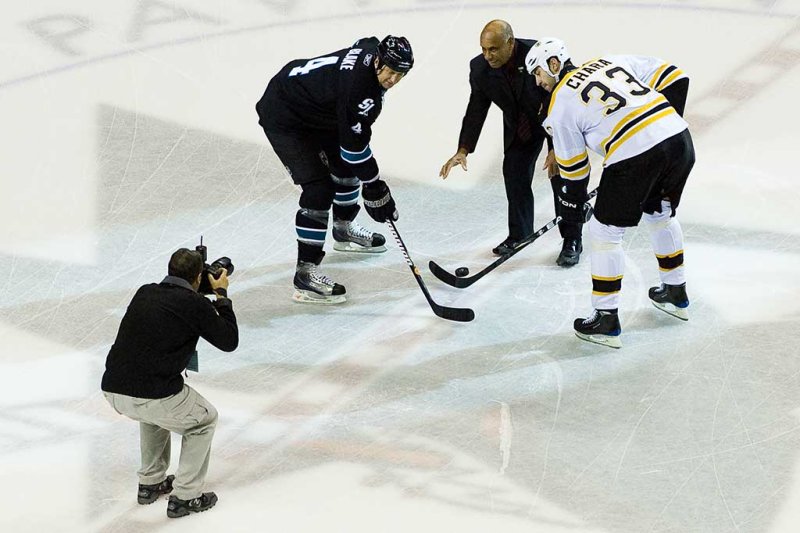 Willie O'Ree drops the ceremonial first puck