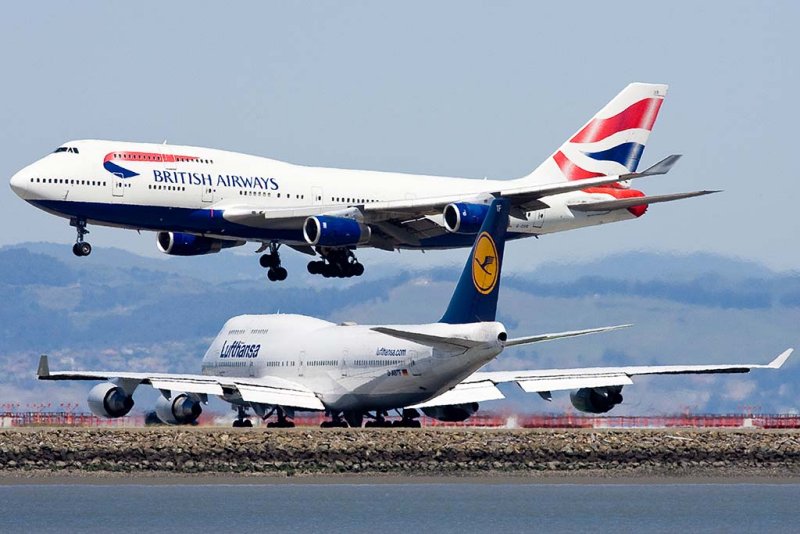 5/6/2010  British Airways Boeing 747-436 G-CIVR landing and Lufthansa Boeing 747-430M D-ABTF waiting to take off
