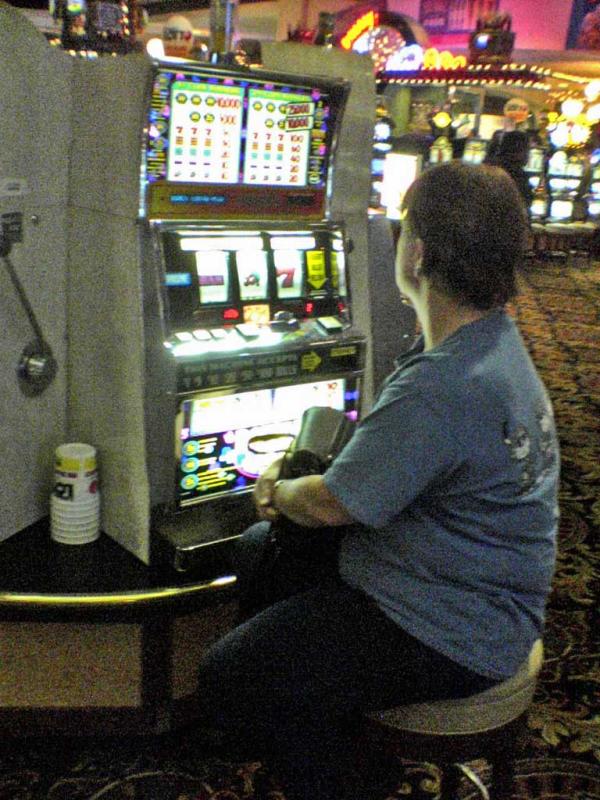 Gail trying her luck at the machine I won on