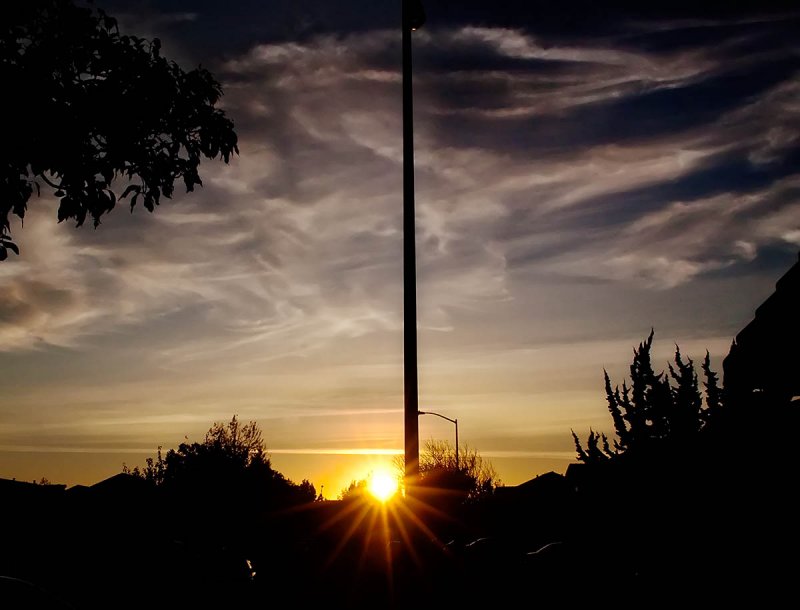 Wispy clouds and sun rays .jpg