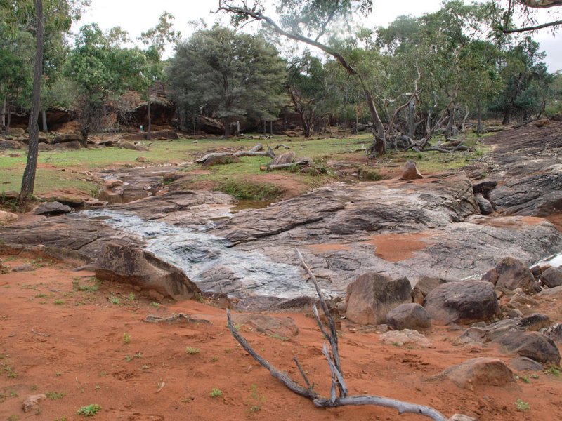 A clear area in front of the caves