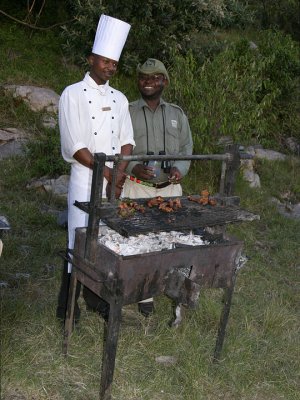 Patrick and Mara Safari Club cook at Sundowners in the bush. jpg.jpg