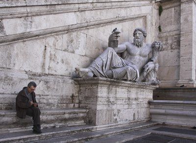 Capitoline River God and Man Reading.jpg