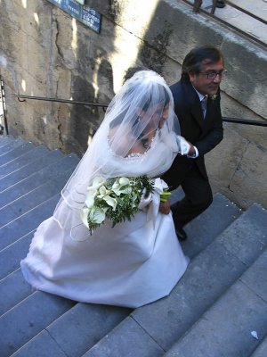 Bride and her father coming up steps .jpg