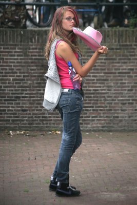 Girl with pink hat.