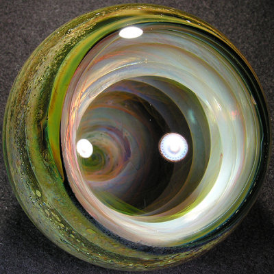 This is a MASSIVE vortex marble that you truly need to hold in your hands to appreciate.