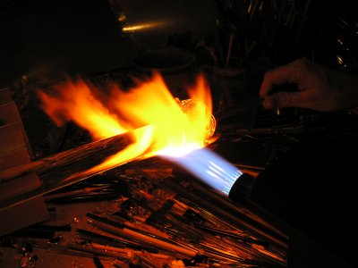 Gathering the large rod to form the lens of the vortex.