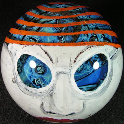 Josh Simpson made the large 'planet' core, Ken Leslie then used glass paint to paint the planet swallowing face.