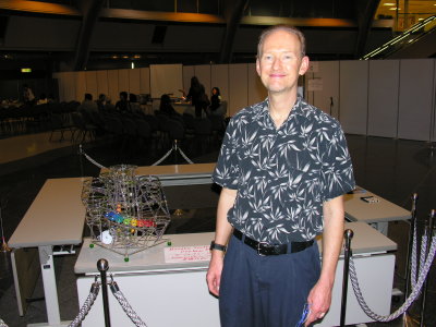 Bandhu next to his creation. He sat 2 rows in front of us on the plane there, Aki gave him a ride with us to the hotel.