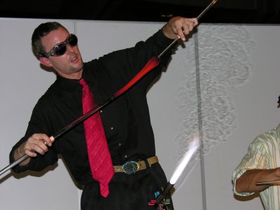Hot cobalt glass! Pulling and twisting a section of the cane.