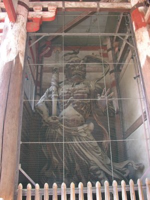 There was one of these massive dudes on either side of the huge entrance. Always two, one mouth open, one closed.