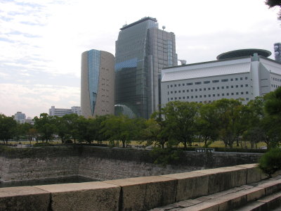 Looking from moat to gleaming new skyscrapers.