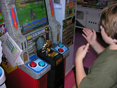 Yeah we hit a Sega arcade.Brendon loved games like this one which dispense a character card which can then be used in game play.