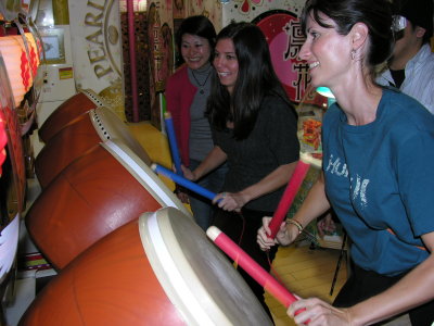 Becky and Melissa had fun on a drum game which taught rhythm.