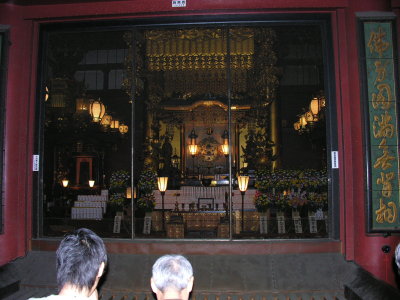 The shrine inside this more ornate temple, not as ancient as others we'd seen down south.