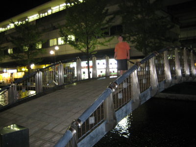 A bridge outside our hotel, Brendon playing (I left the party after a half hour or so, made some paper airplanes for B first).