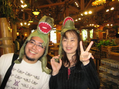 Ono and Yuko model the Dino Hats.