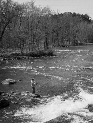 Fisherman at Kesheena Falls.jpg