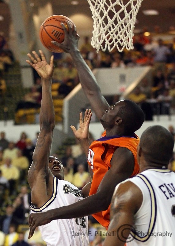 Jackets G Shumpert has his shot blocked under the basket by Tigers F Grant