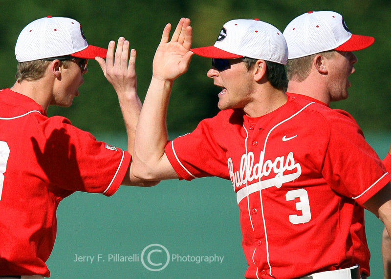 UGA 3B Ryan Peisel high-fives his teammates