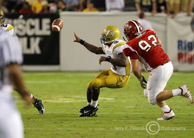 Tech QB Nesbitt pitches to B-back Dwyer as JSU NT Brandt Thomas closes in