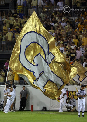 The Georgia Tech flag flashes across the field after a second half score