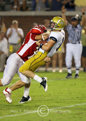 Jackets QB Shaw is leveled after scoring a TD resulting in a penalty against JSU