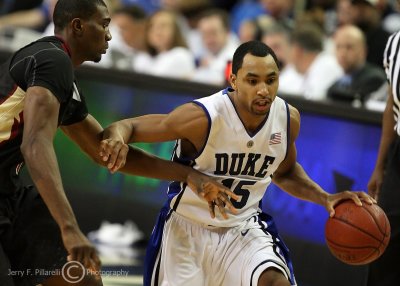 Blue Devils G Henderson attempts to get inside on an FSU defender