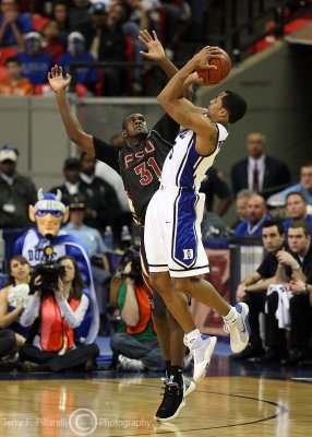 Duke G Henderson elevates for a three and is fouled by FSU G Singleton