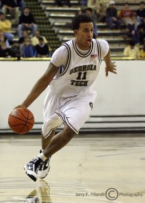 Georgia Tech F Oliver drives along the sideline